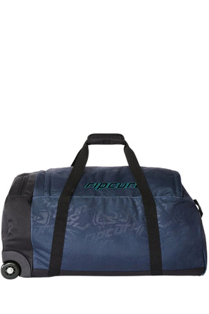 Large navy blue Rip Curl Jupiter Archive 80L rolling duffel bag with black straps and wheels.