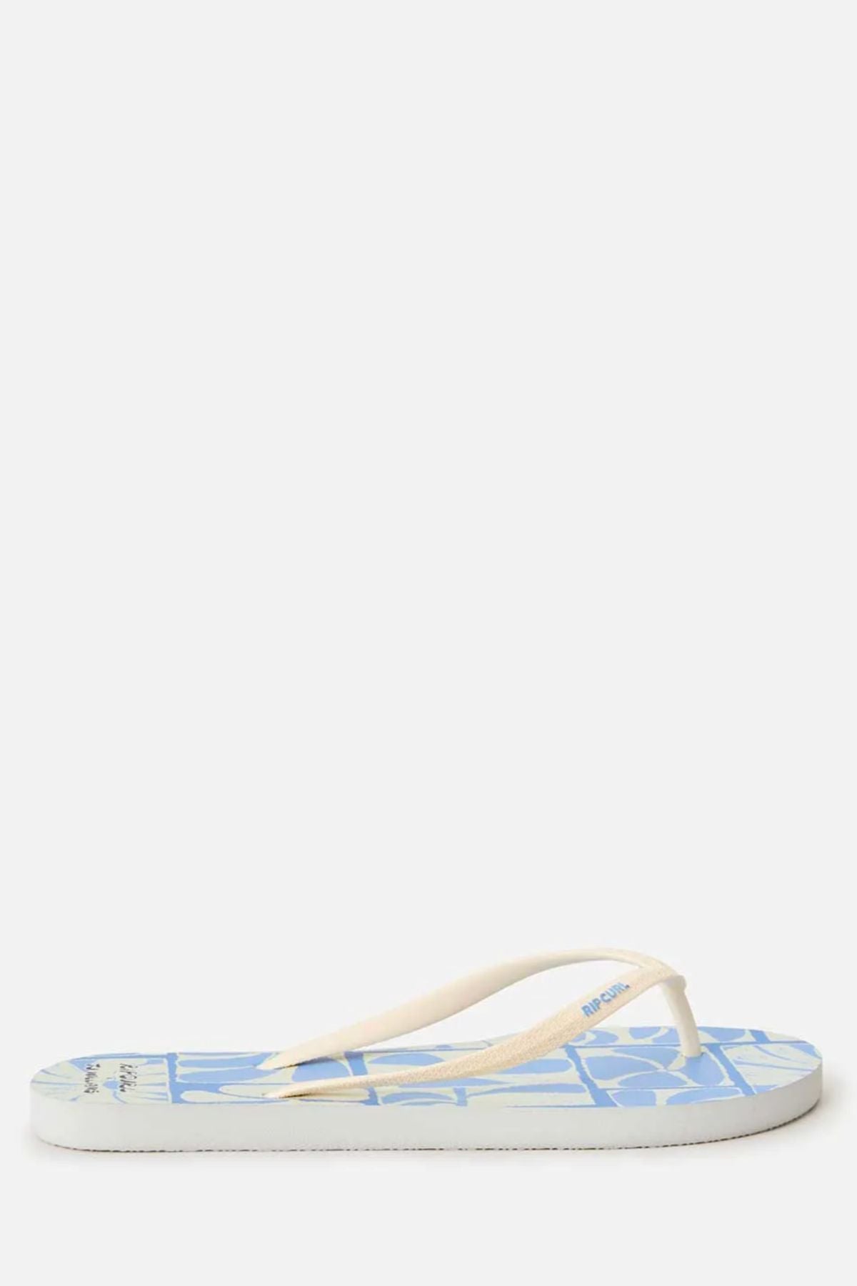 A Rip Curl Mixed Bloom Thong with a white sole, light blue graphic, and white straps. Features a comfy 3-point design and is made from eco-friendly algae-blended EVA foam. Shown on a plain light background.