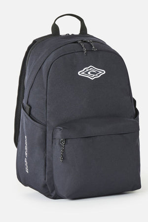 Black Rip Curl Crusher 30L Classic Backpack with a front zip pocket, side pockets, and a white logo on the top front.