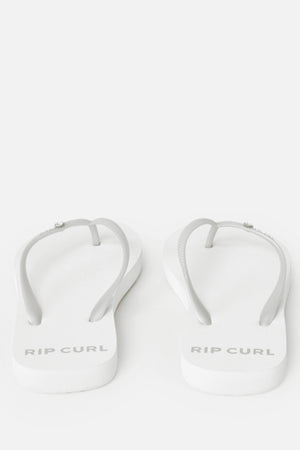 The Rip Curl Premium Surf Bloom Thongs feature a white base with light gray straps and the brand name printed in gray on the heel, making them a stylish beach footwear choice. Displayed on a plain white background.