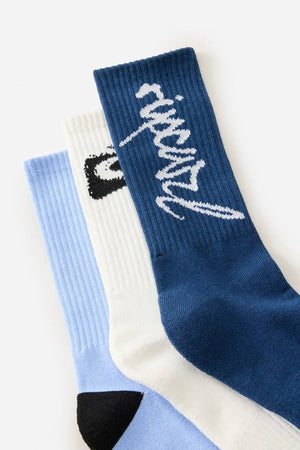 The Rip Curl Retro Crew Sock 3 Pack includes three cushioned crew socks in light blue with a black toe, white with a small black design, and dark blue featuring "respect" in cursive—designed for all-day comfort.