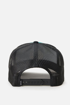 The black Rip Curl Surf Revival Trucker hat is shown from the back, featuring an adjustable plastic snap closure and a small side tag on the left.