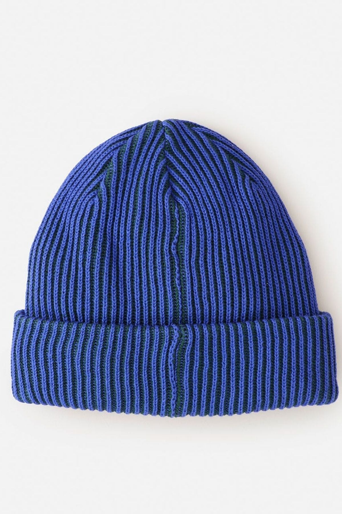 The Rip Curl Search Chunky Reg Beanie, in blue and dark green ribbed knit with a folded cuff and made from 100% cotton, is the perfect cold weather accessory, shown on a white background.