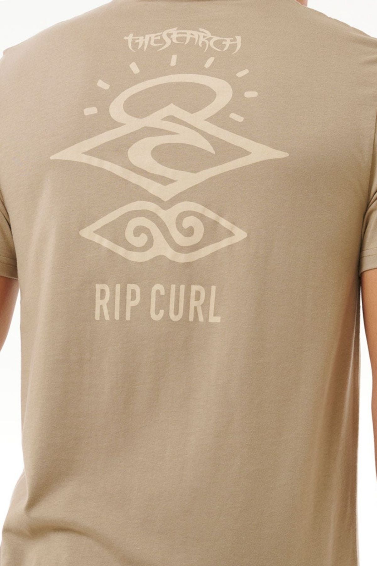 The Rip Curl Search Icon Tee features the "RIP CURL" logo on the back with abstract white symbols and patterns. Made from organic cotton, it merges style with sustainability.
