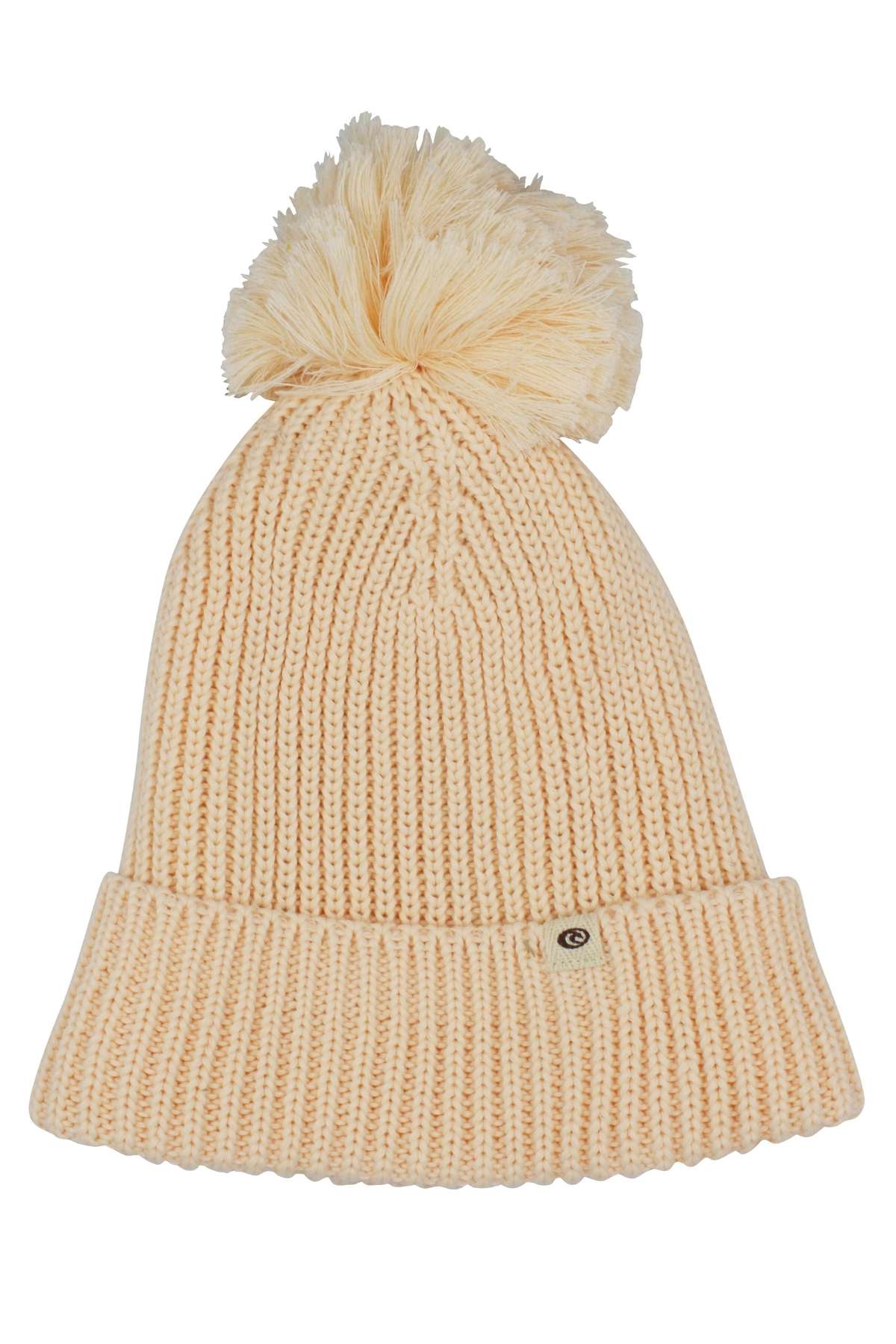 The Rip Curl Sol Seeker Pom Pom Beanie is a beige knitted accessory featuring a large pom-pom on top and a folded brim. It includes a small circular tag attached to the brim and showcases a ribbed pattern made from recycled polyester.