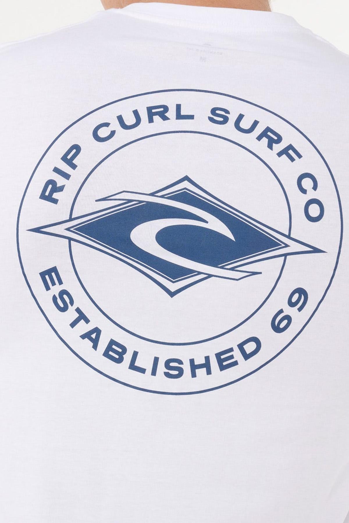 The Rip Curl Staple Tee’s back showcases the Surf Co. logo—a stylized wave in a diamond—and “RIP CURL SURF CO ESTABLISHED 69” in a circle, delivering classic style to any men’s casual wardrobe.