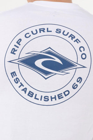 The Rip Curl Staple Tee’s back showcases the Surf Co. logo—a stylized wave in a diamond—and “RIP CURL SURF CO ESTABLISHED 69” in a circle, delivering classic style to any men’s casual wardrobe.