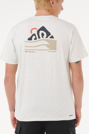 A person with short blonde hair is shown from behind wearing the Rip Curl Vaporcool Search Range Tee—a light gray, quick-drying, moisture-wicking shirt with a black, beige, and red “RIP CURL search gear” graphic on the back.