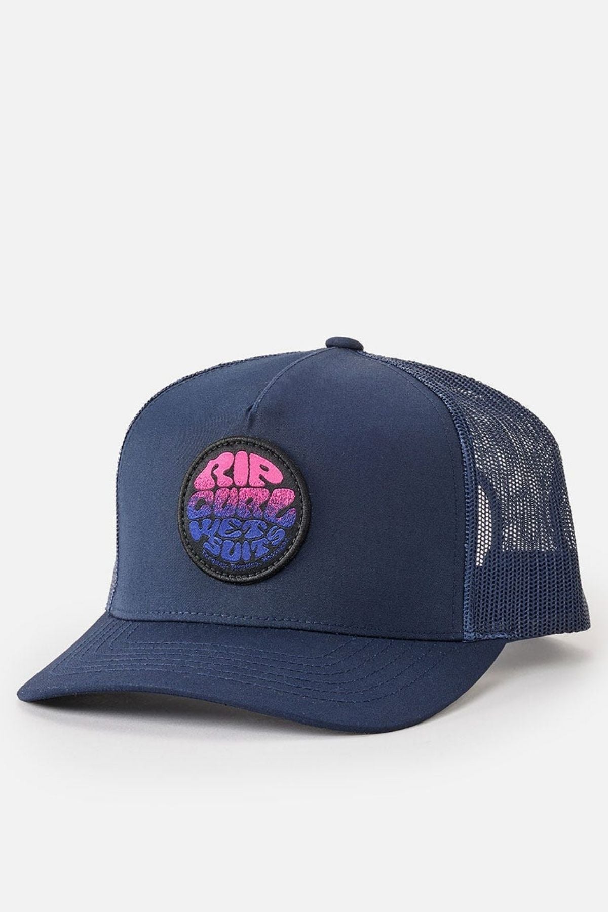 Introducing the Rip Curl Wetsuit Icon Trucker, a stylish navy blue cap boasting a mesh back and a distinctive front patch. This patch showcases a circular design with a captivating gradient of pink and blue hues paired with text. Crafted from recycled polyester, the cap is further enhanced by its curved brim and adjustable strap for optimal comfort.