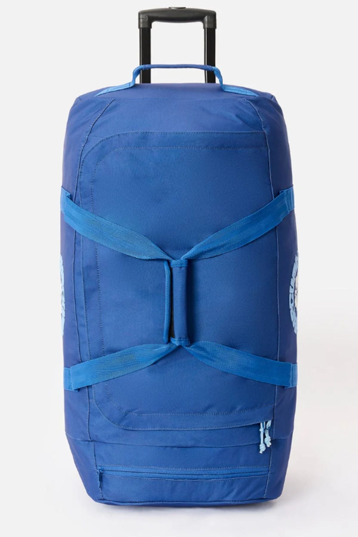 The Rip Curl Jupiter 80L Mixed Travel Bag is a spacious blue travel bag with handles, a zippered pocket, and a retractable black handle for rolling. It stands upright against a plain light background.