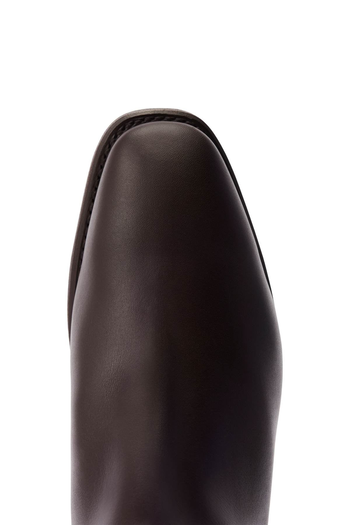 Close-up of the toe area of an RM Williams Comfort Craftsman Boot in dark brown handcrafted leather, featuring a square toe design, viewed from above against a white background.