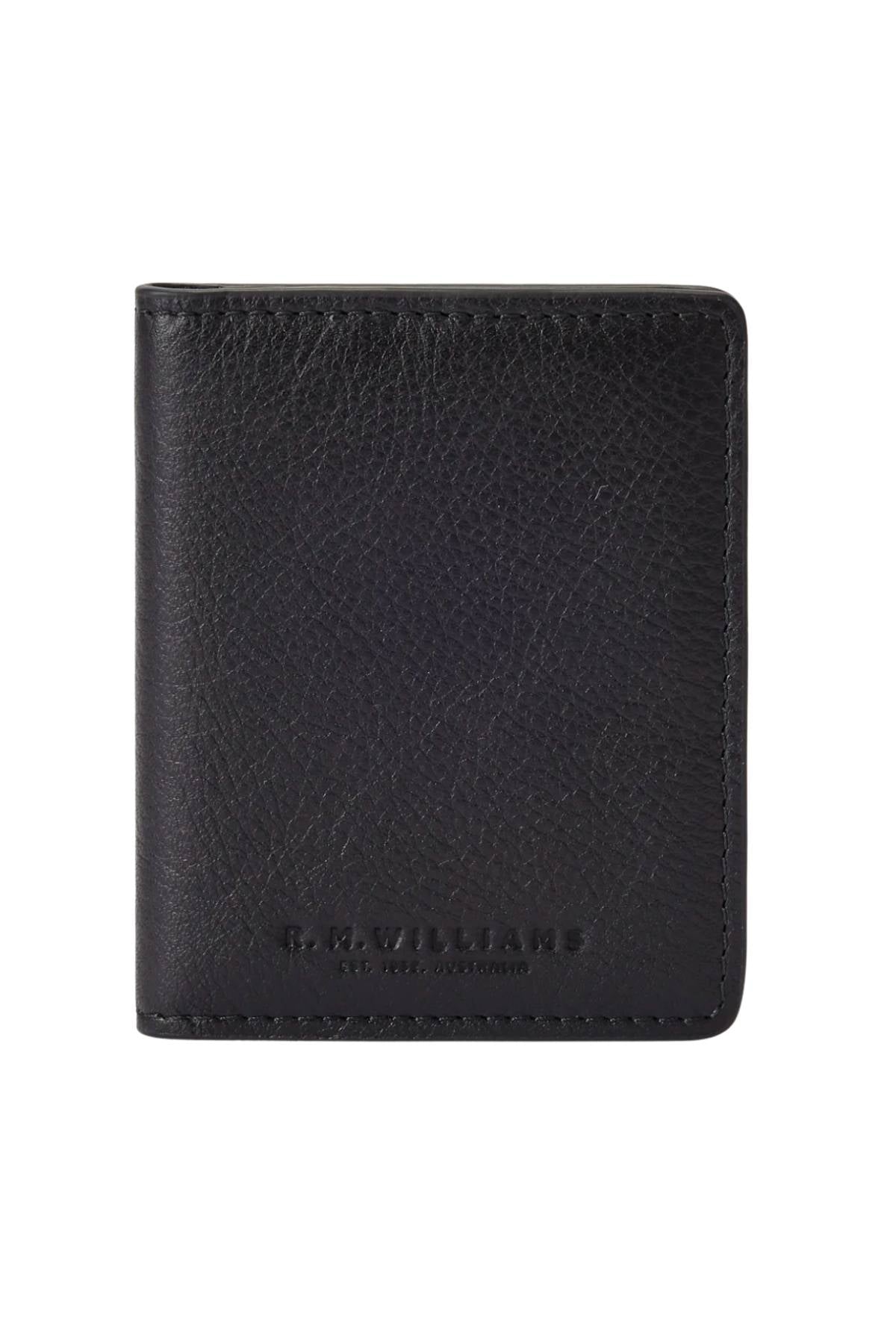 The RM Williams Farrier Fold Cardholder is a black full-grain leather wallet with a textured surface and the R.M.Williams logo embossed near the bottom on the front.