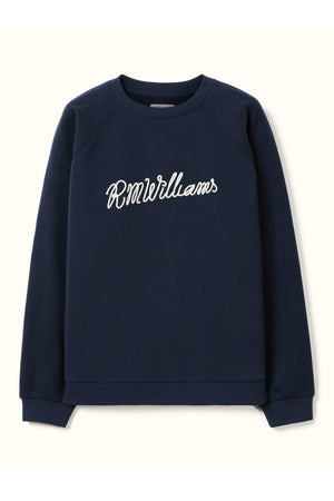 The RM Williams Lasso Brushed Sweatshirt is a navy crewneck with "R.M. Williams" embroidered in white cursive on the chest, crafted from Australian Good Earth Cotton and finished with ribbed cuffs and hem for a classic look.