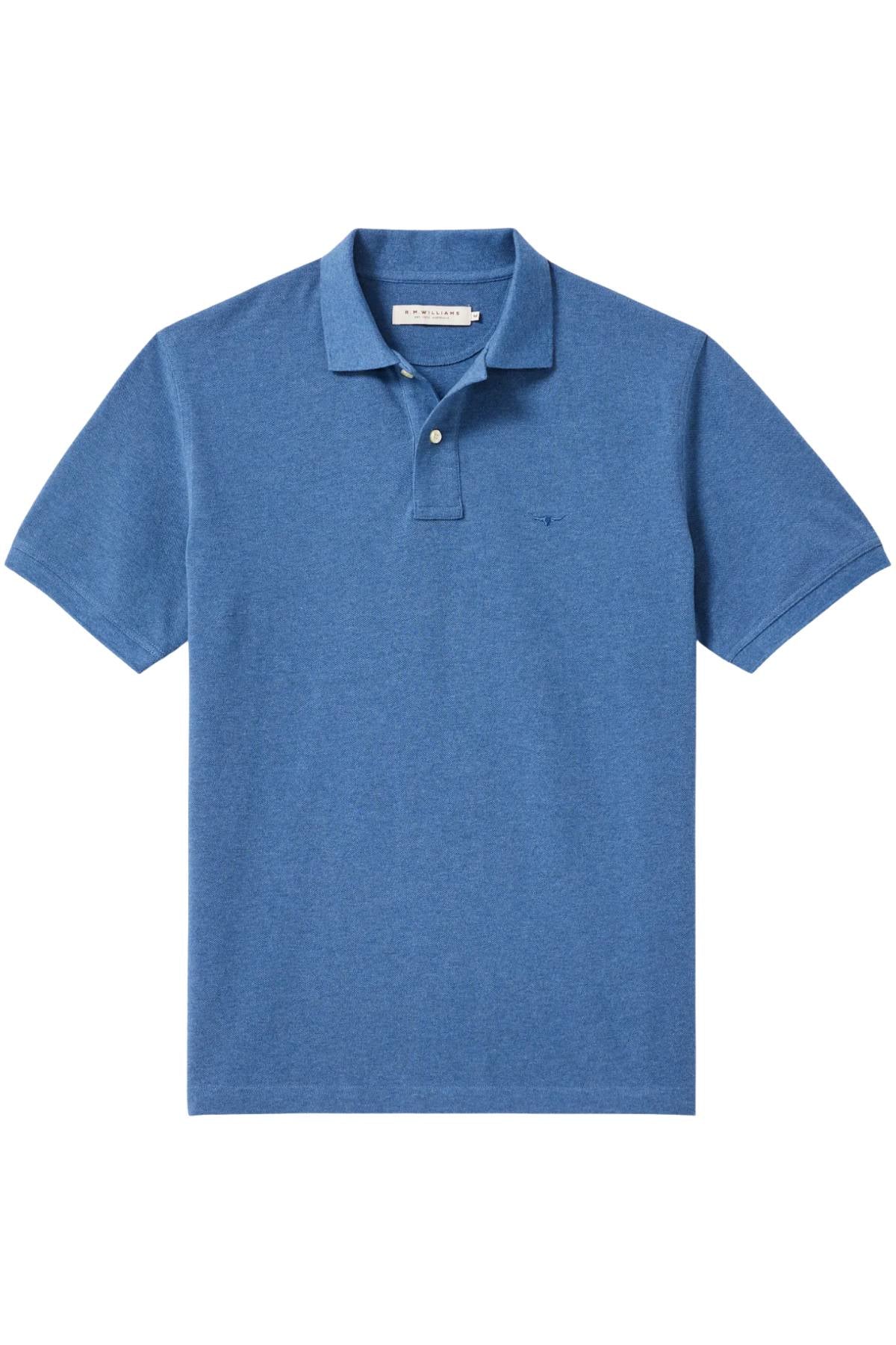 The RM Williams Rod Polo is a plain blue short-sleeve shirt made from organic cotton, featuring a collar, two neck buttons, and subtle Longhorn embroidery, shown on a white background.