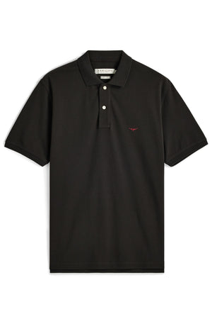 RM Williams Rod Polo: A black short-sleeve polo shirt featuring a collar, three white buttons, and a small red logo on the left chest.
