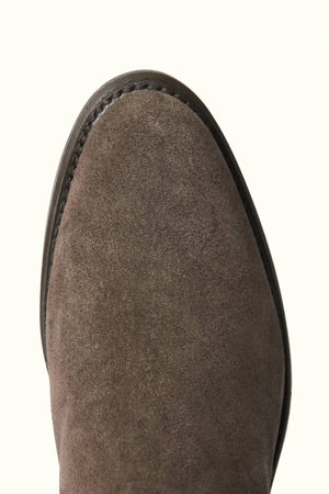 Close-up of the toe area of an RM Williams Rosebery Boot in brown suede leather, showcasing visible edge stitching and a smooth, rounded shape.