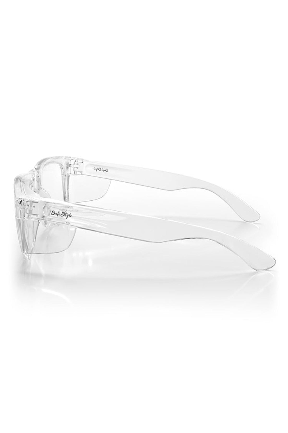 The SafeStyle Fusions XL eyeglasses feature a clear plastic frame with a rectangular lens shape. Displayed side-on against a white background, these shatterproof frames offer dependable UV protection, blending style with safety in one design.