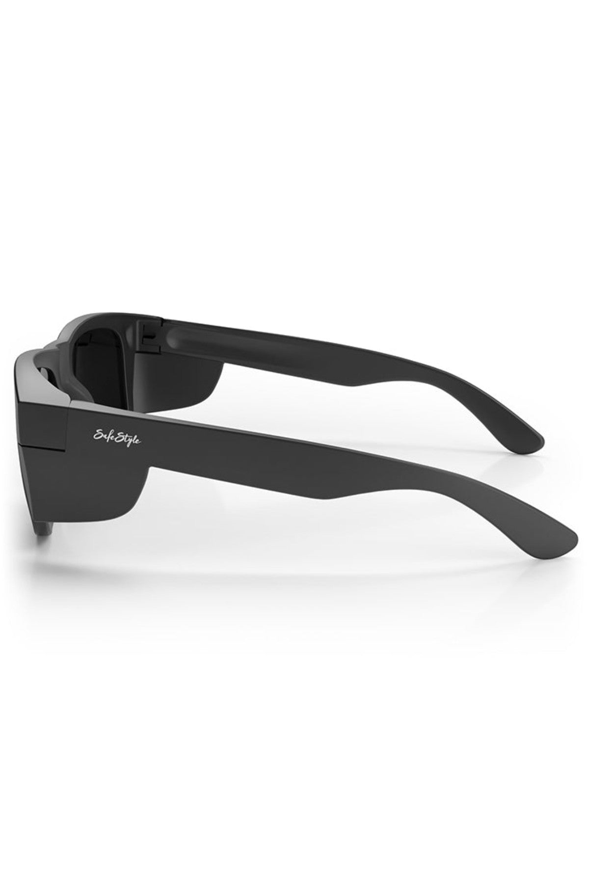 Side view of the SafeStyle Fusions XL Matte Black Frame Polarised Lens sunglasses, featuring thick, shatterproof frames and wide temples. The bridge and lenses are partially visible and showcase polarised lenses. A small white logo is present on the temple. The image displays a clean, modern design with UV protection.
