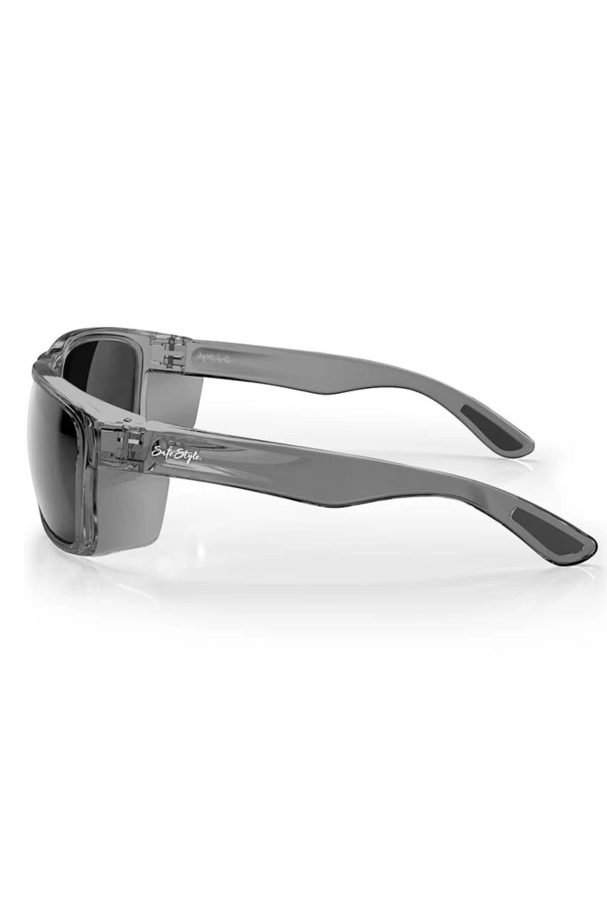 The SafeStyle Rapids features a sturdy graphite frame and polarised dark lenses with UV protection. These semi-transparent gray sunglasses display the brand logo on the temple, offering style and durability from a side view.