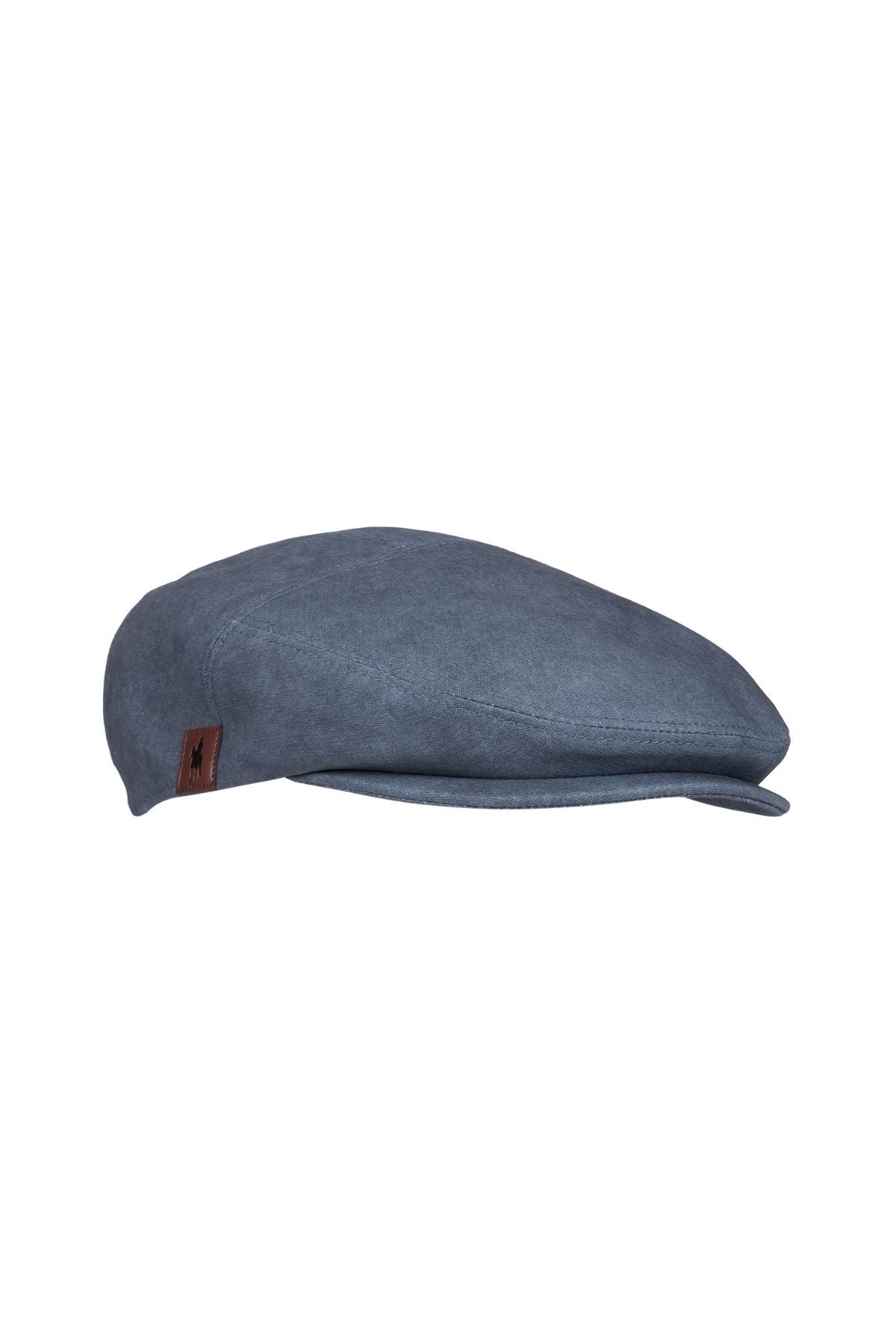 A premium cotton Thomas Cook Evan Driver Cap in blue, featuring a short brim and a small brown tag on the side, inspired by classic Thomas Cook style and displayed against a white background.