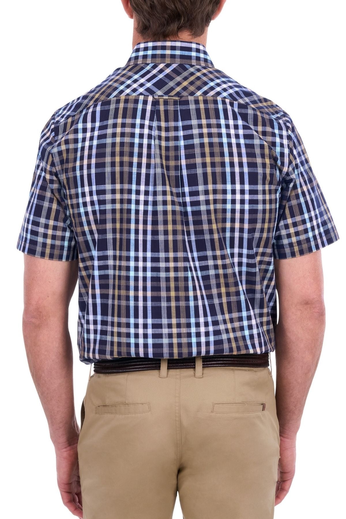A man shown from the back against a white background wears the Thomas Cook Finley Short Sleeve Shirt, featuring blue and brown plaid workwear style, paired with tan pants.