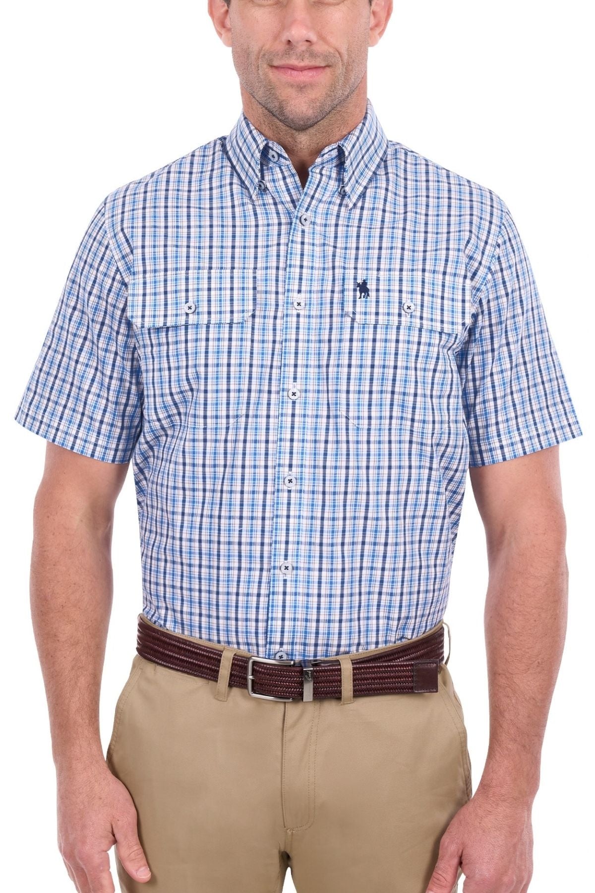A man wearing the Thomas Cook Jude Short Sleeve Shirt, a blue and white plaid button-up made from 100% cotton, paired with khaki pants and a brown belt, stands against a white background.