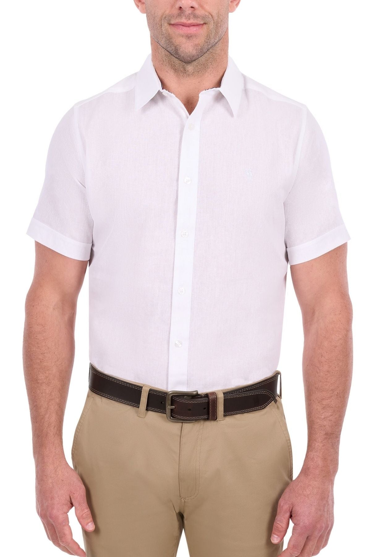 A man wearing the Thomas Cook Linen Short Sleeve Shirt, neatly tucked into beige pants with a dark brown belt, stands against a plain white background.