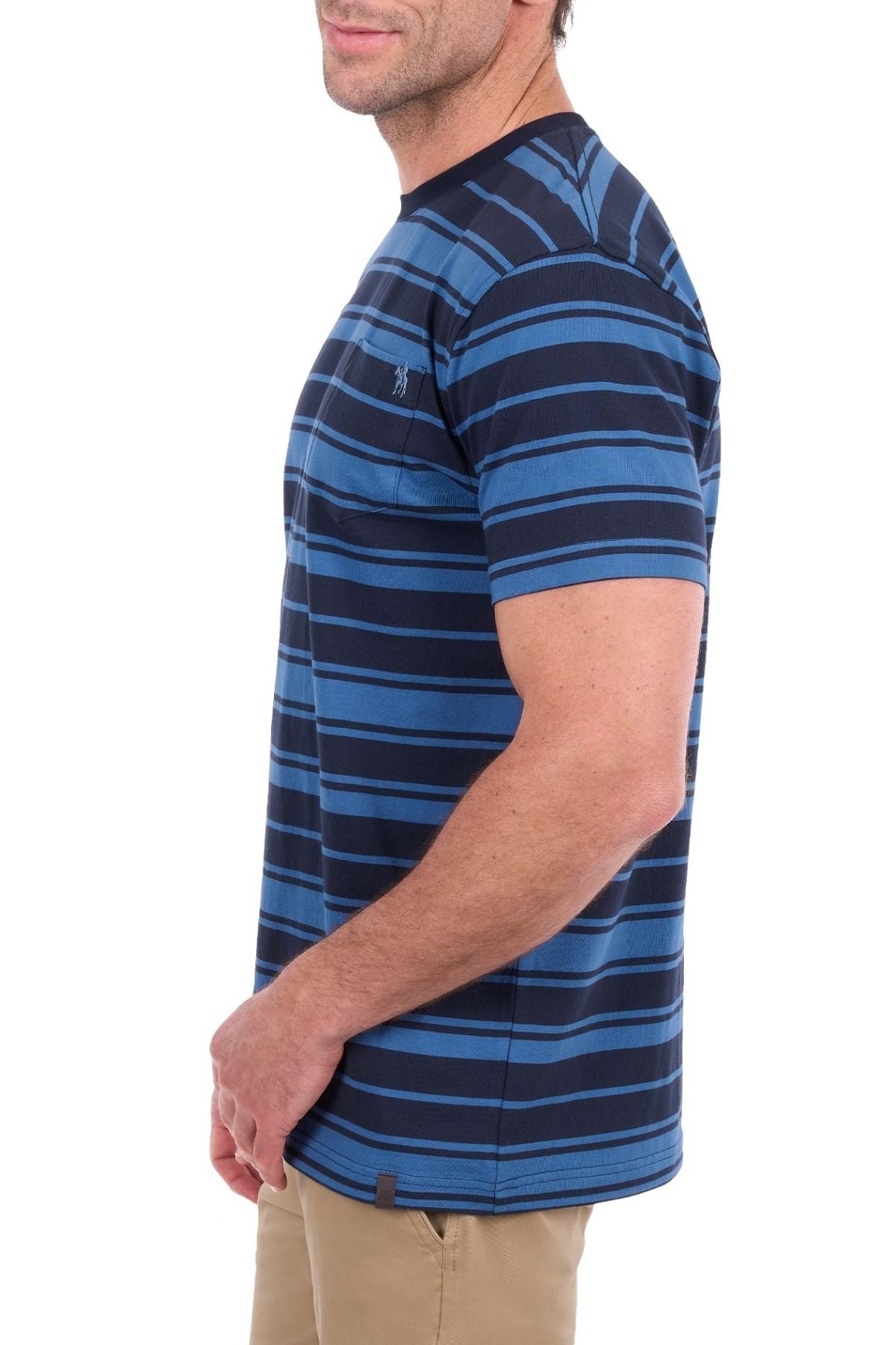 A man is shown from the side against a white background wearing the Thomas Cook Pete Tee—a blue and black striped cotton jersey short-sleeve t-shirt—and khaki pants.