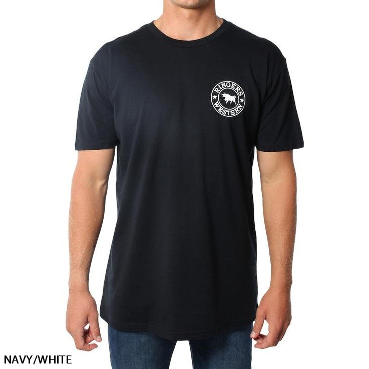 A person is wearing a Ringers Western Signature Bull Original Fit T-Shirt in navy blue, made from 100% cotton, featuring a small white emblem on the left chest area. The text "NAVY/WHITE" is written in the bottom left corner of the image. This comfortable T-shirt offers a simple, casual design.