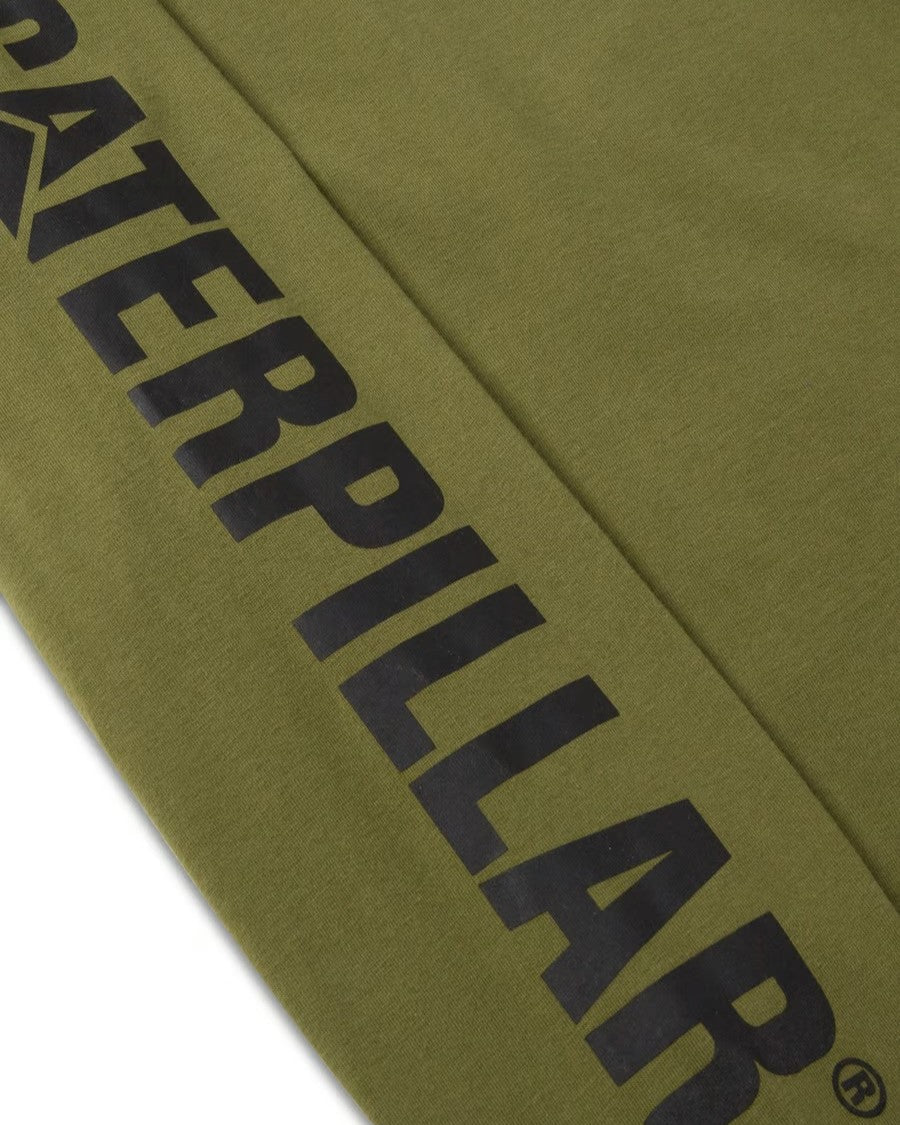 A close-up of a comfortable olive green long sleeve tee, showcasing "CATERPILLAR" in bold black letters along the seam. This is the CAT Trademark Banner Long Sleeve Tee.