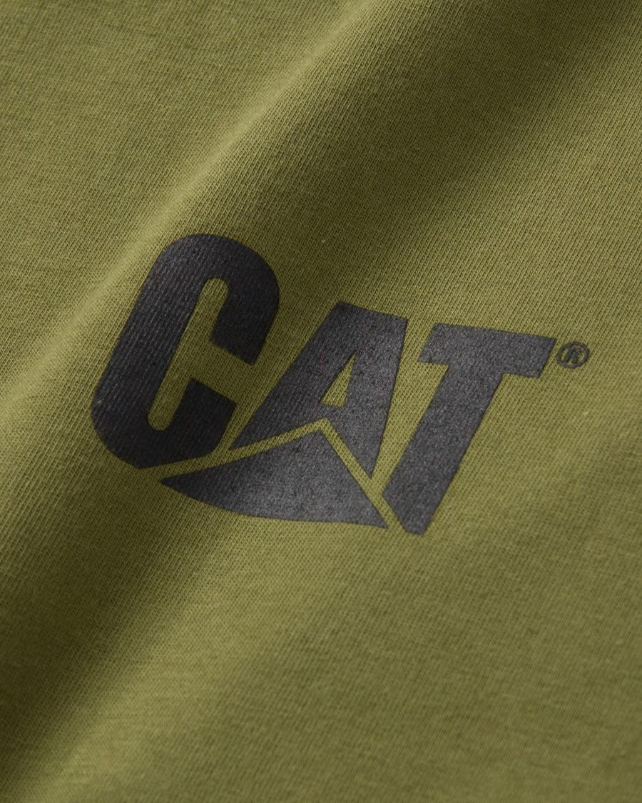 Close-up of a green CAT Trademark Banner Long Sleeve Tee featuring a bold black "CAT" logo with a stylized "A" and triangular design, crafted from 100% Cotton for ultimate comfort.