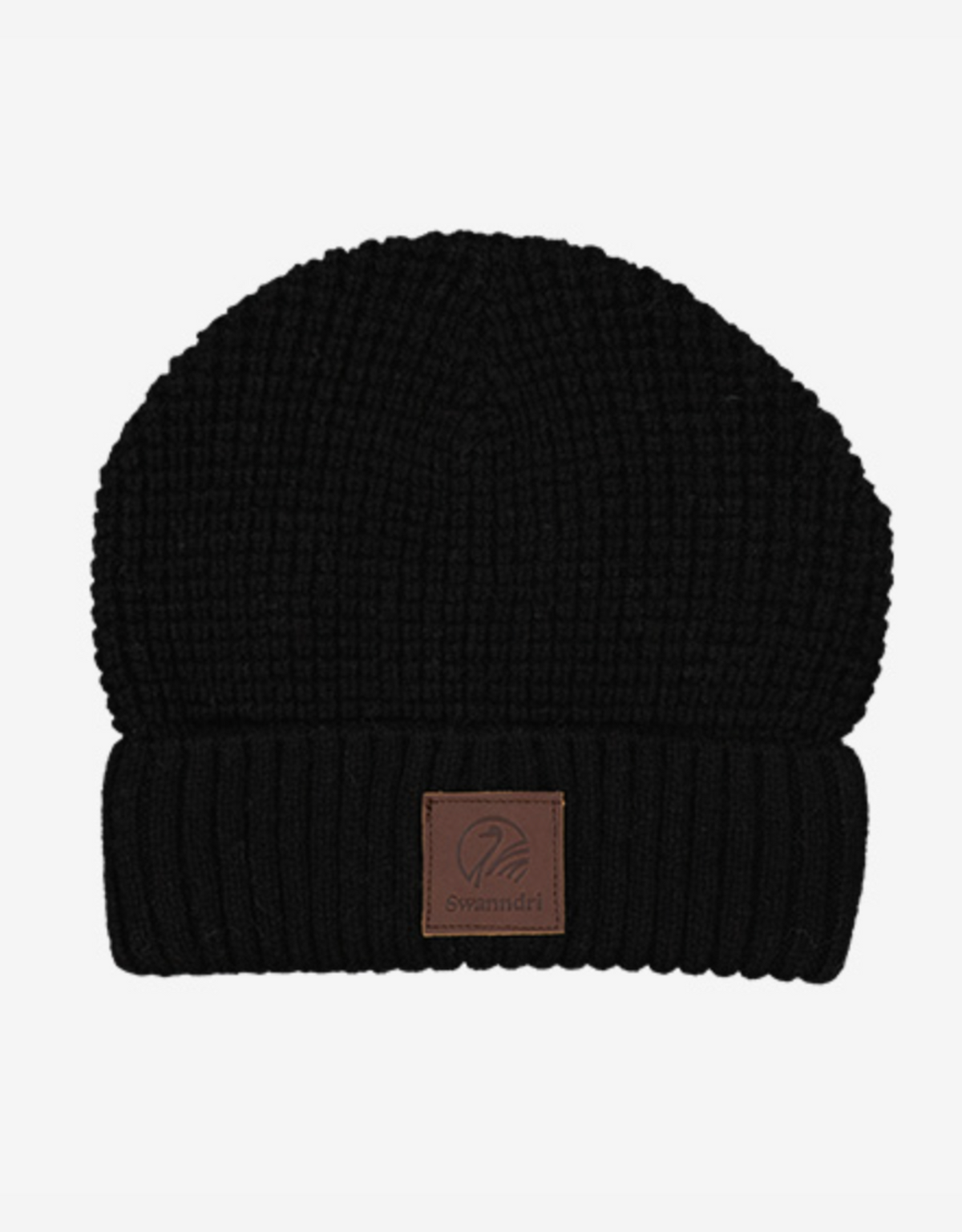 The Swanndri Newgale Beanie is a black lambswool beanie with a folded brim and a brown leather patch featuring the Swanndri logo on the front.
