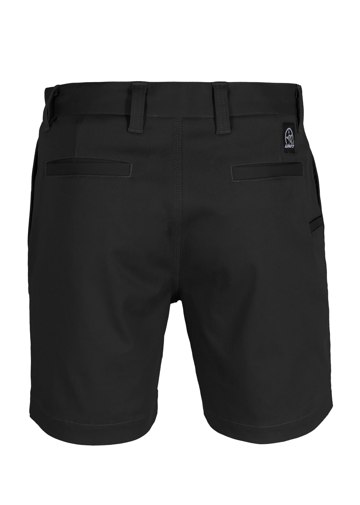 The UNIT Trench Stretch Work Short in black, shown from the back, features belt loops, a reinforced button, two back welt pockets, and a small stitched logo patch on the upper waistband.