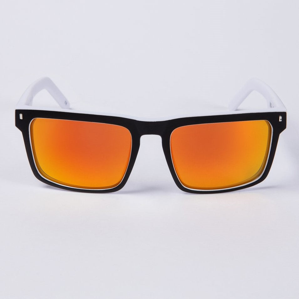 Introducing the UNIT Primer Polarised Eyewear: a pair of stylish sunglasses featuring a lightweight white frame. The polarised lenses are rectangular and boast a vivid gradient, transitioning from orange to yellow. Offering UV protection, these modern and sleek sunglasses are set against a plain white background.