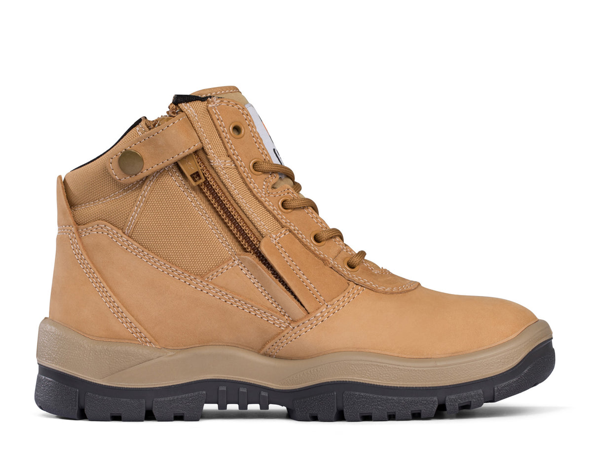 The Australian-made Mongrel ZipSider Safety Boot 261050 is a tan leather work boot equipped with a side zipper and laces, featuring a rugged black rubber sole. It boasts reinforced stitching, a padded ankle collar for enhanced support and comfort, as well as slip-resistant properties to ensure safety in various environments.