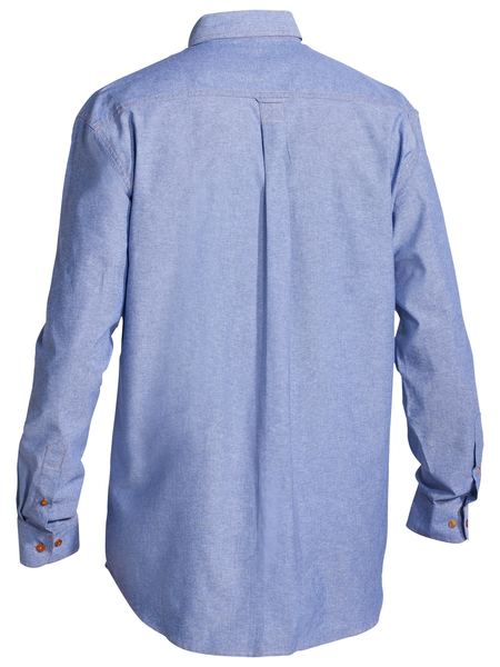 Back view of the Bisley Chambray Cotton Shirt in light blue with brown cuff buttons, a straight back yoke, center box pleat, and classic collar. Traditional Fit.