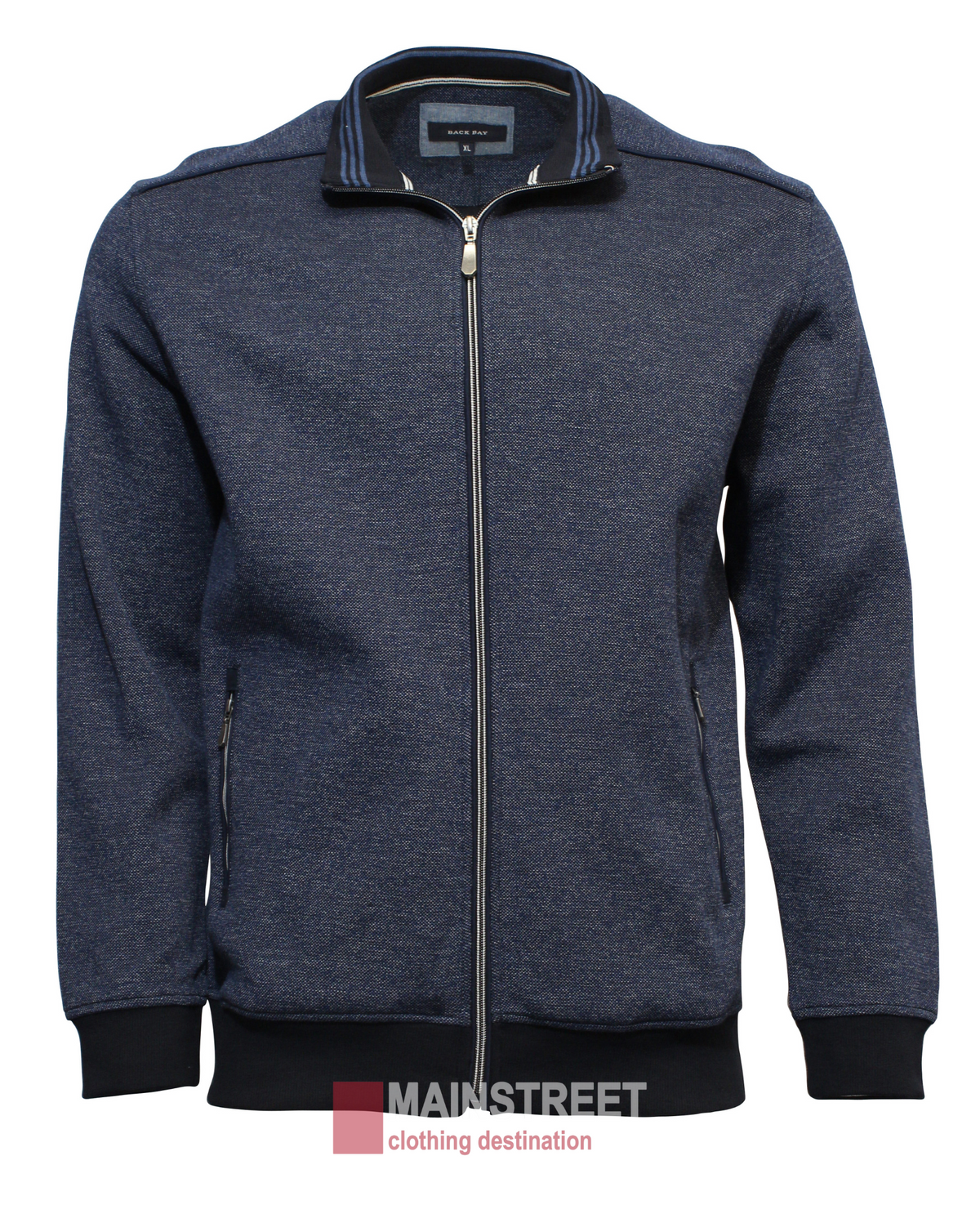 The Back Bay Two Tone Birdseye Fleece is a navy blue zip-up jumper with a ribbed collar, sleeves, and waistband for a perfect regular fit. It includes two front zippered pockets and features the Mainstreet Clothing Destination logo at the bottom.