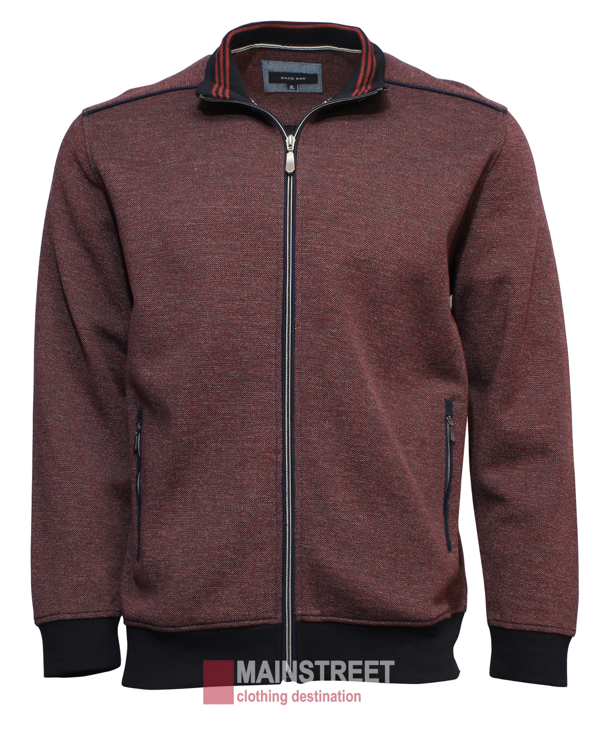 The Back Bay Two Tone Birdseye Fleece is a maroon zip-up jacket featuring a black collar and cuffs, two zippered pockets, and a logo on the chest. It's perfect for casual outings and is set against a plain white background with the "Mainstreet Clothing Destination" watermark at the bottom.