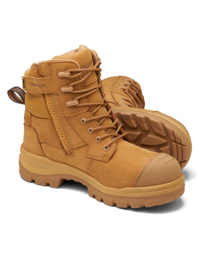 The Blundstone RotoFlex 8560 High Zip Side Safety Boot is a pair of rugged, tan-colored safety boots with sturdy soles and reinforced toes. These work boots feature side zippers, lace-up fronts, padded collars, and a loop at the back for easy pull-on. The outsole is equipped with deep treads for enhanced grip and durability.
