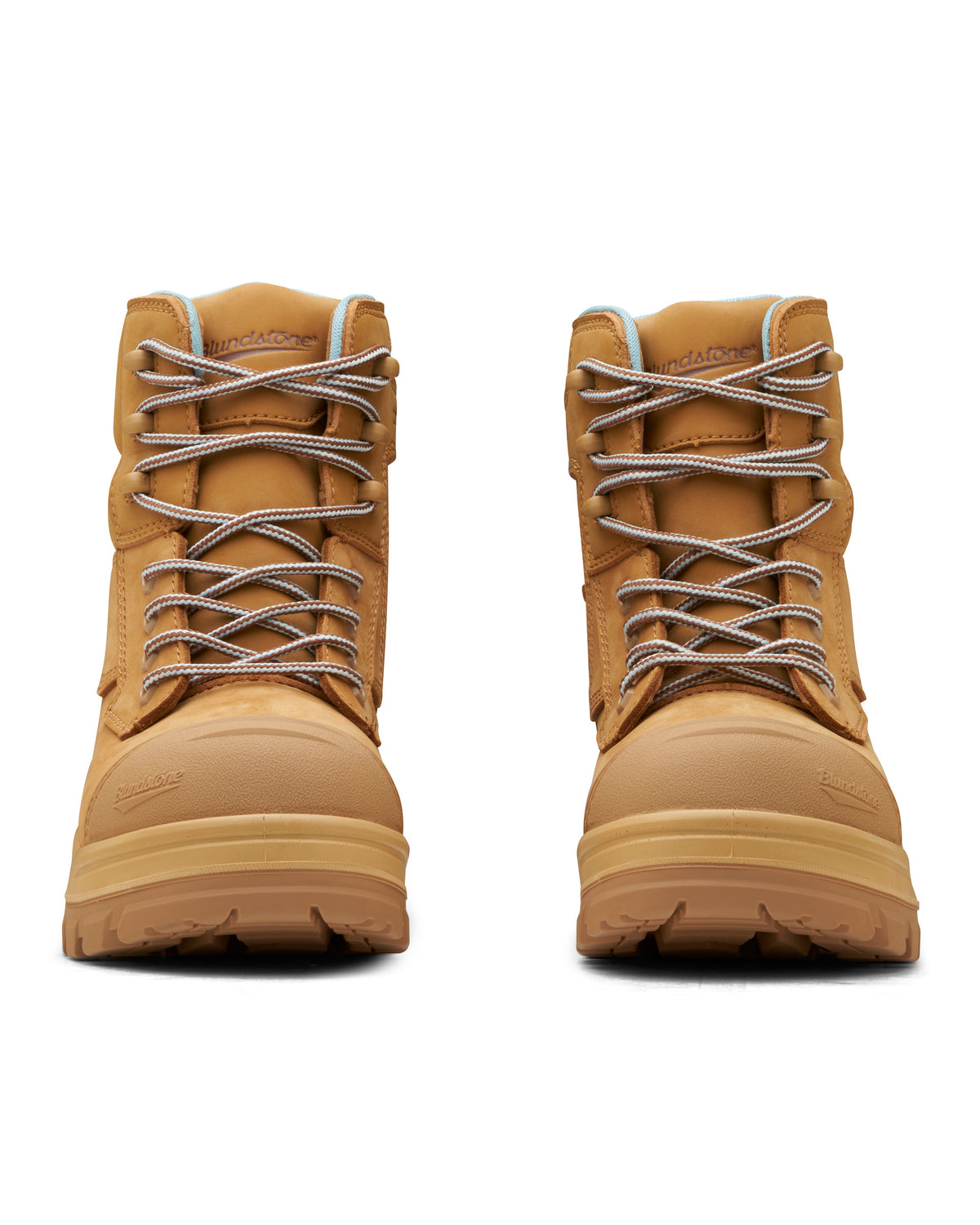 These tan leather hiking boots feature sturdy soles and silver laces. Known as the Blundstone RotoFlex Womens 8860 High Zip Side Safety Boot, they boast a rugged look perfect for outdoor activities, making them ideal women's work or safety boots in challenging terrains.