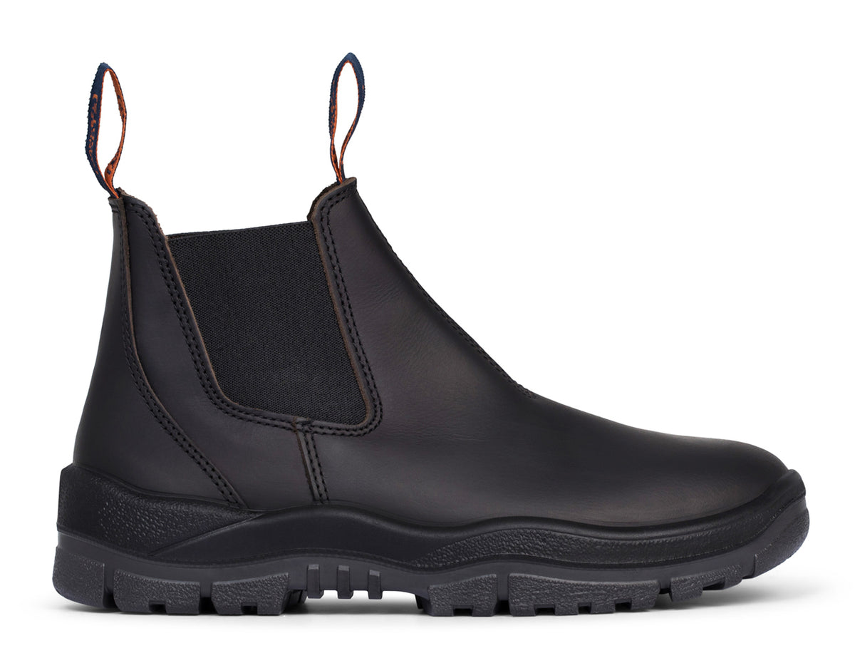 Introducing the Mongrel Non Safety Elastic Sided Boot 916020: A side view of this black Chelsea boot showcases its rounded toe, elastic side panels, sturdy rubber sole with deep treads, and convenient pull tabs at both the front and back for easy wear. Crafted from high-quality leather, this boot boasts a sleek, minimalist design enhanced by reinforced stitching. These comfortable boots are perfect for any occasion.