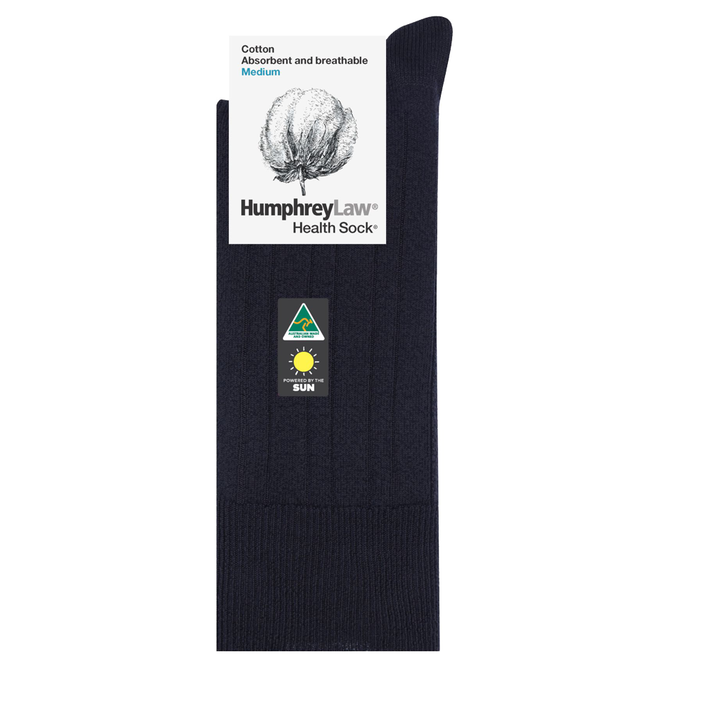A navy blue Humphrey Law Pure Cotton Sock with tags attached. The tag displays a cotton symbol and lists features such as "Absorbent and breathable" and "Medium." There is also a small emblem indicating the lightweight, breathable sock is made in Australia.