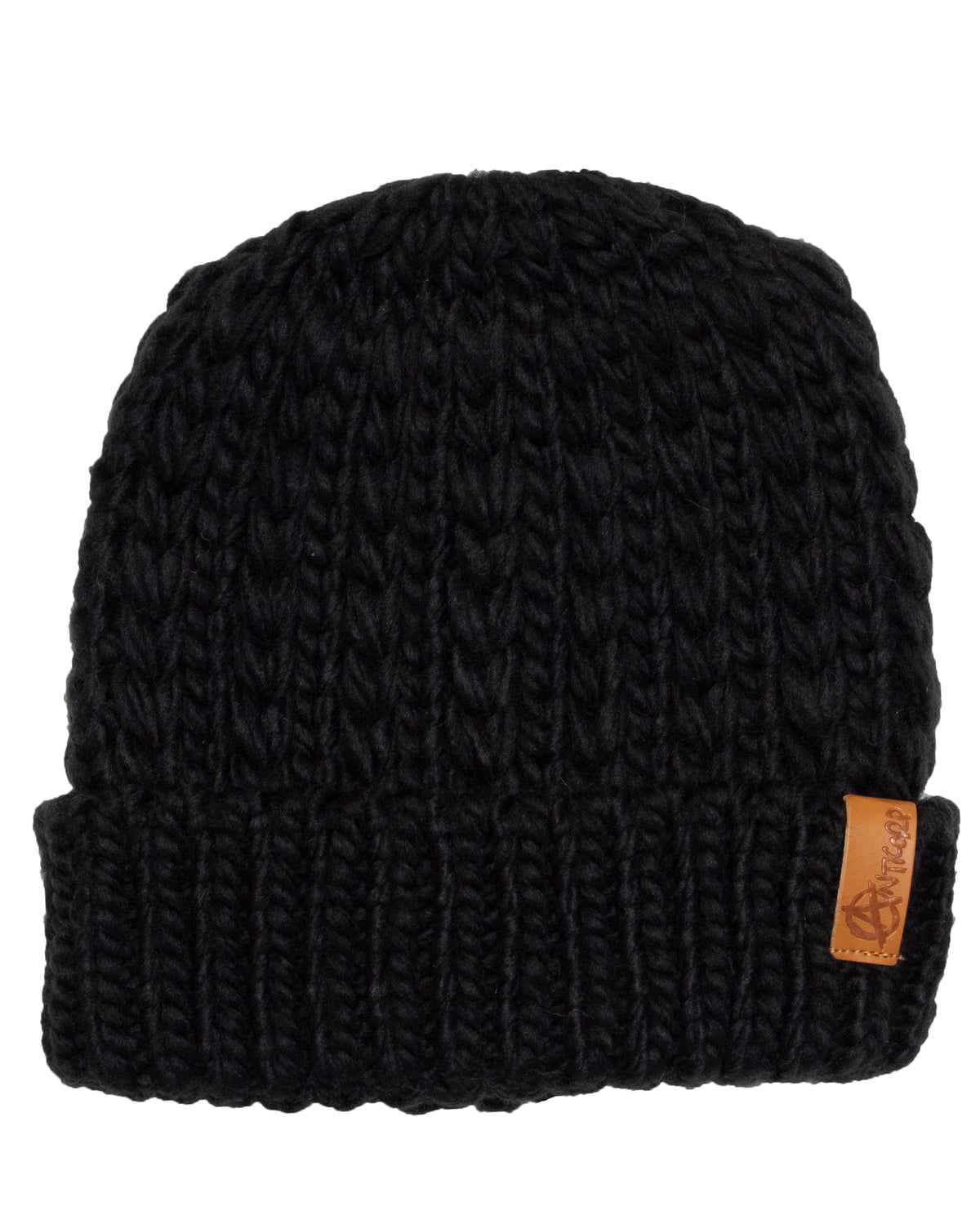 A close-up image of a black Anticorp Ladies Softy Beanie with a folded-knit roll cuff. The hat features thick, chunky stitches and a small brown leather patch with a logo on the brim. Made from acrylic, the texture and details of the beanie are highlighted against the white background.