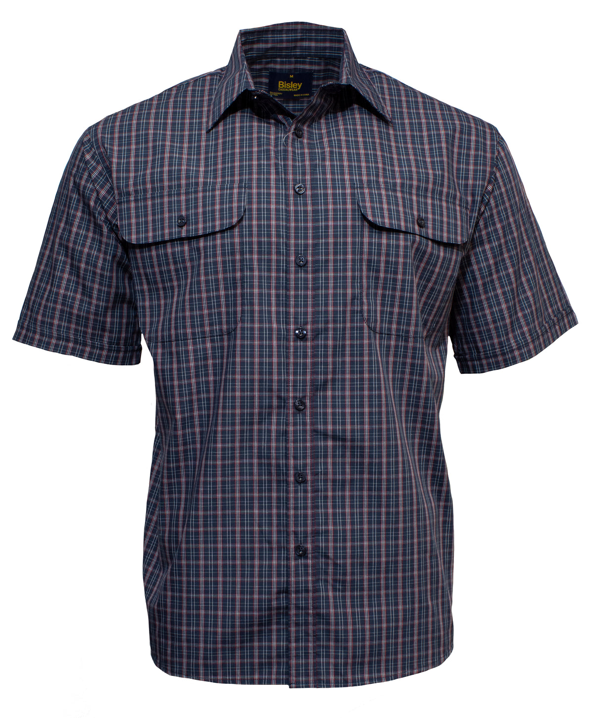 The Bisley Countryman Short Sleeve Shirt is a button-up featuring a navy, red, and gray plaid pattern. It includes a collar and two buttoned chest pockets with flaps, made from a durable Polyester/Cotton blend.