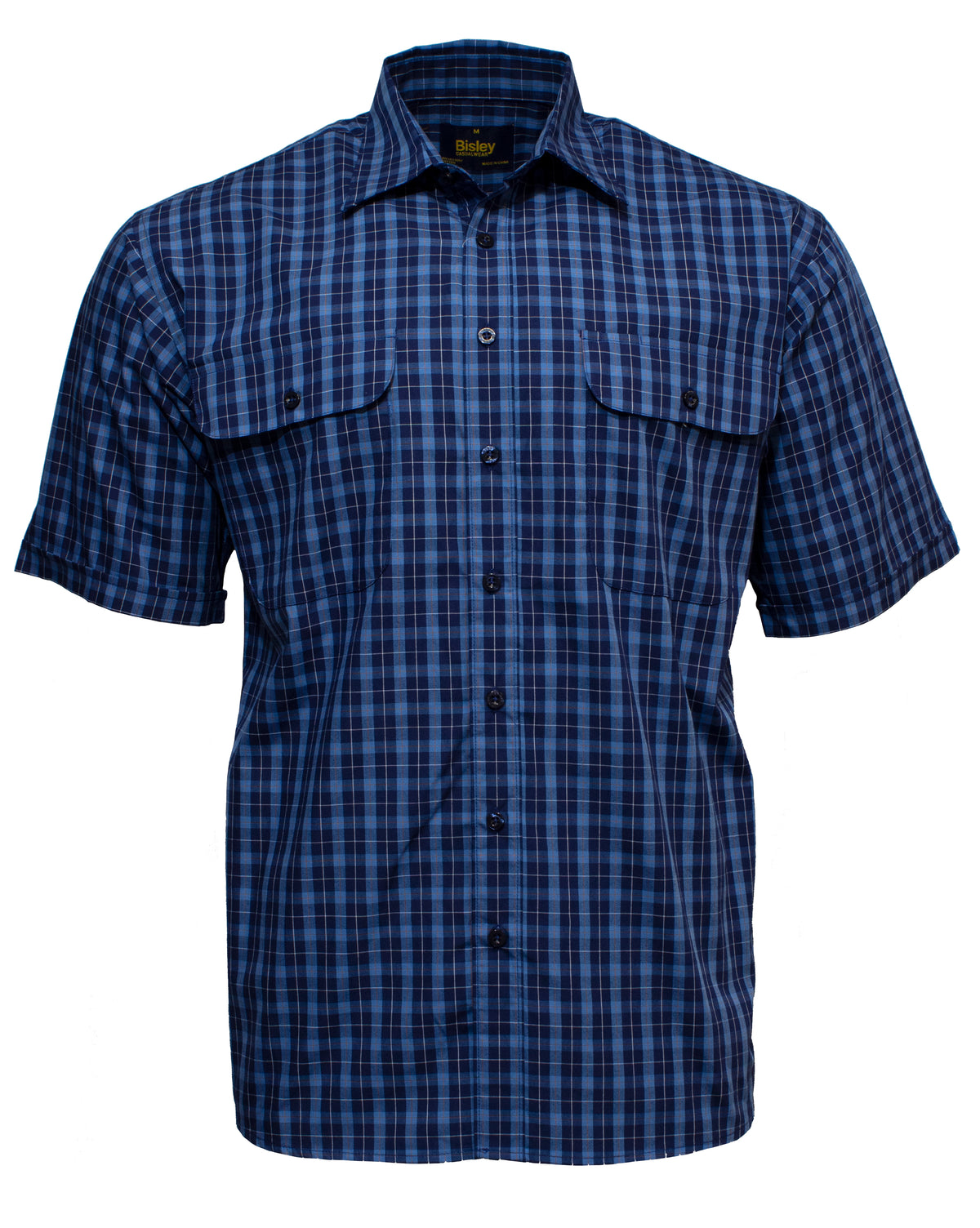 The Bisley Countryman Short Sleeve Shirt is a blue and black checkered button-up made from a durable polyester/cotton blend. It has two buttoned front pockets, a pointed collar, and a straight hem for a classic look.