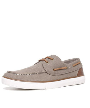 The Colorado Ailon Canvas is a gray lace-up shoe made from a canvas and leather blend. It features brown leather laces, trim, and a white rubber sole, with a stitched moccasin-style toe angled for side and top views.