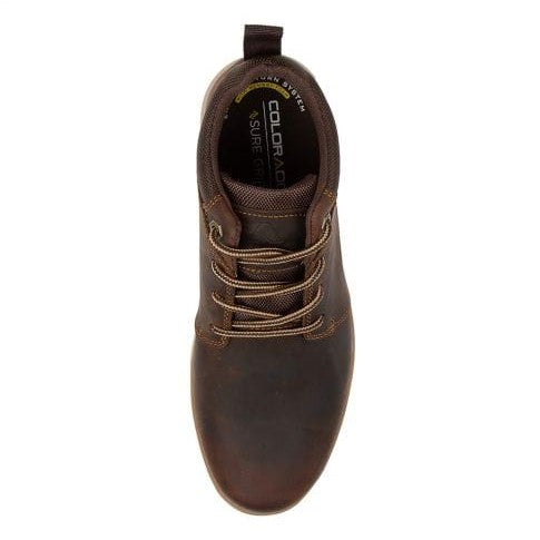 Top view of a single Colorado Yarra Casual Boot in brown leather with a smooth finish. The boot features memory foam insoles, brown laces, and visible stitching around the edge. "COLORADO" is printed on the insole against a black background along with the brand logo or text. Additionally, the boot is equipped with a pull tab at the heel.