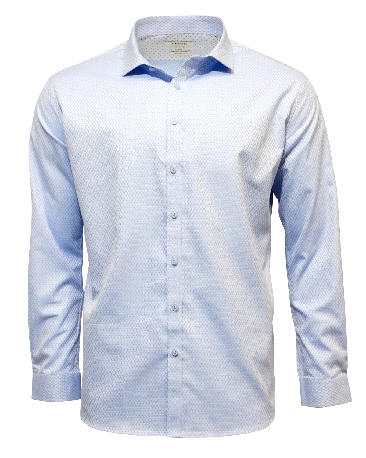 The Seine Dress Shirt is light blue with a long sleeve, button-up design. It features a contemporary fit and subtle geometric print, complemented by a classic collar, shown on a plain white background.