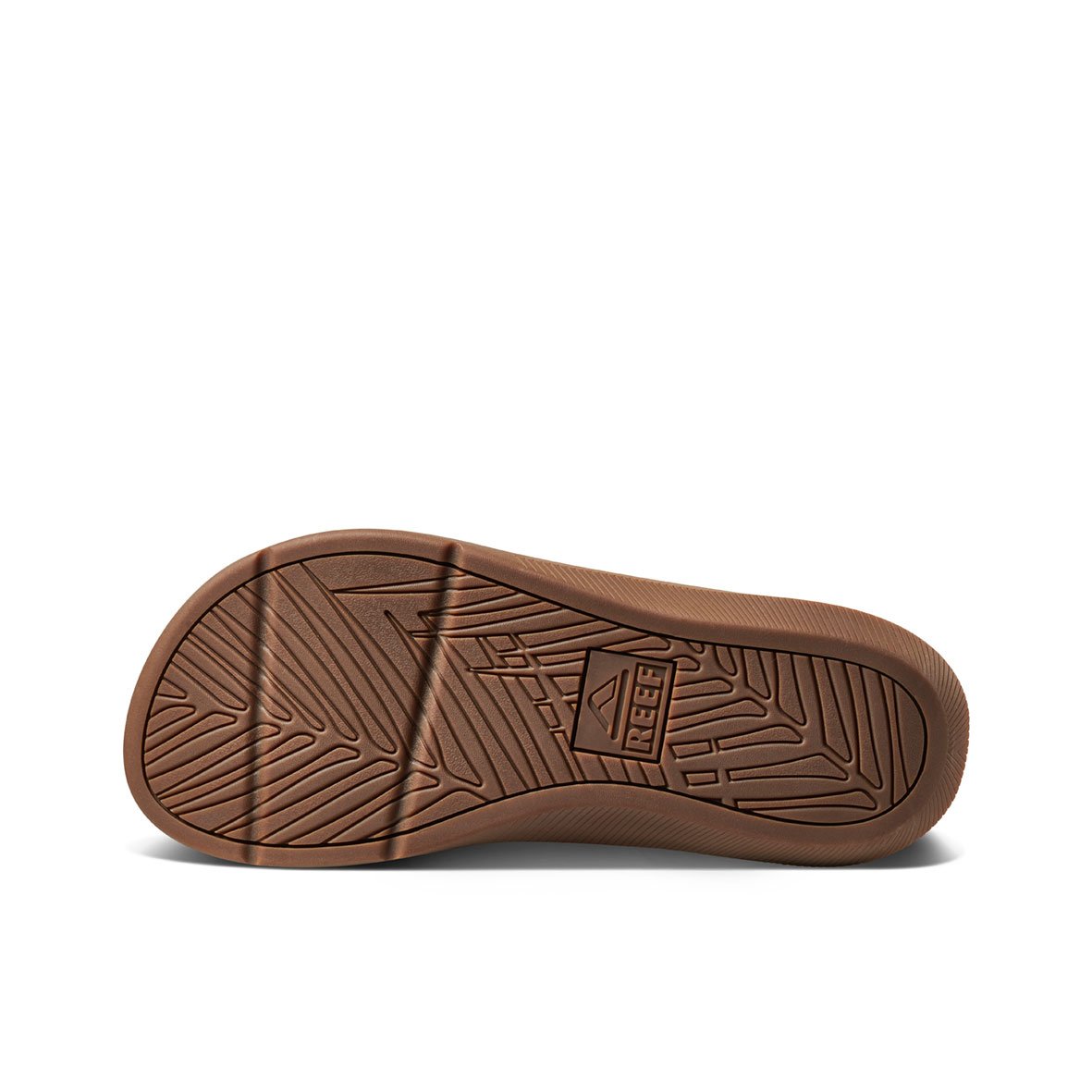 The image showcases the sole of the REEF Santa Ana, a brown, water-friendly flip-flop featuring a textured pattern. The word "REEF" is embossed in the center of the sole. The design incorporates various lines and shapes to provide grip and traction, making these comfortable thongs ideal for everyday wear.