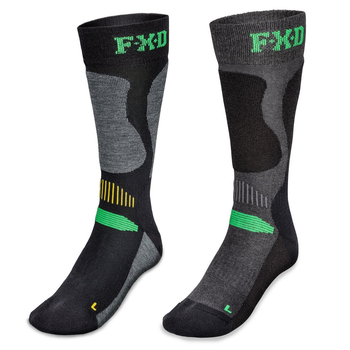 Image of two FXD SK-7 Tech Socks in black and gray with green and yellow accents, designed for optimal support and comfort. The ergonomic design features reinforced areas, moisture-wicking fabric, and the letters "FXD" woven at the top. Each sock is marked with an "L" for the left foot.
